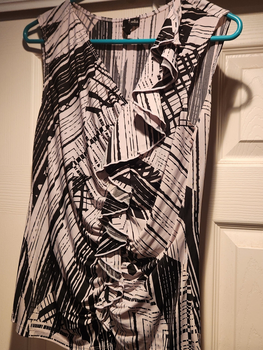 Milano Black & White Ruffle-Front Sleeveless Top
